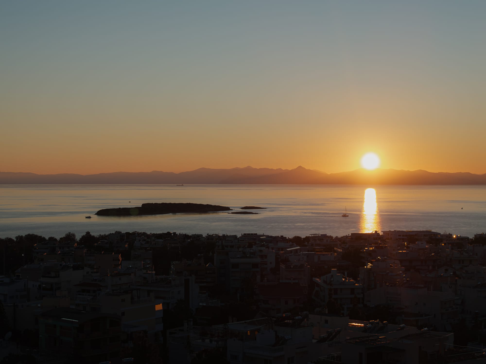 Sunset over the Saronic Gulf from the rooftops of Voula